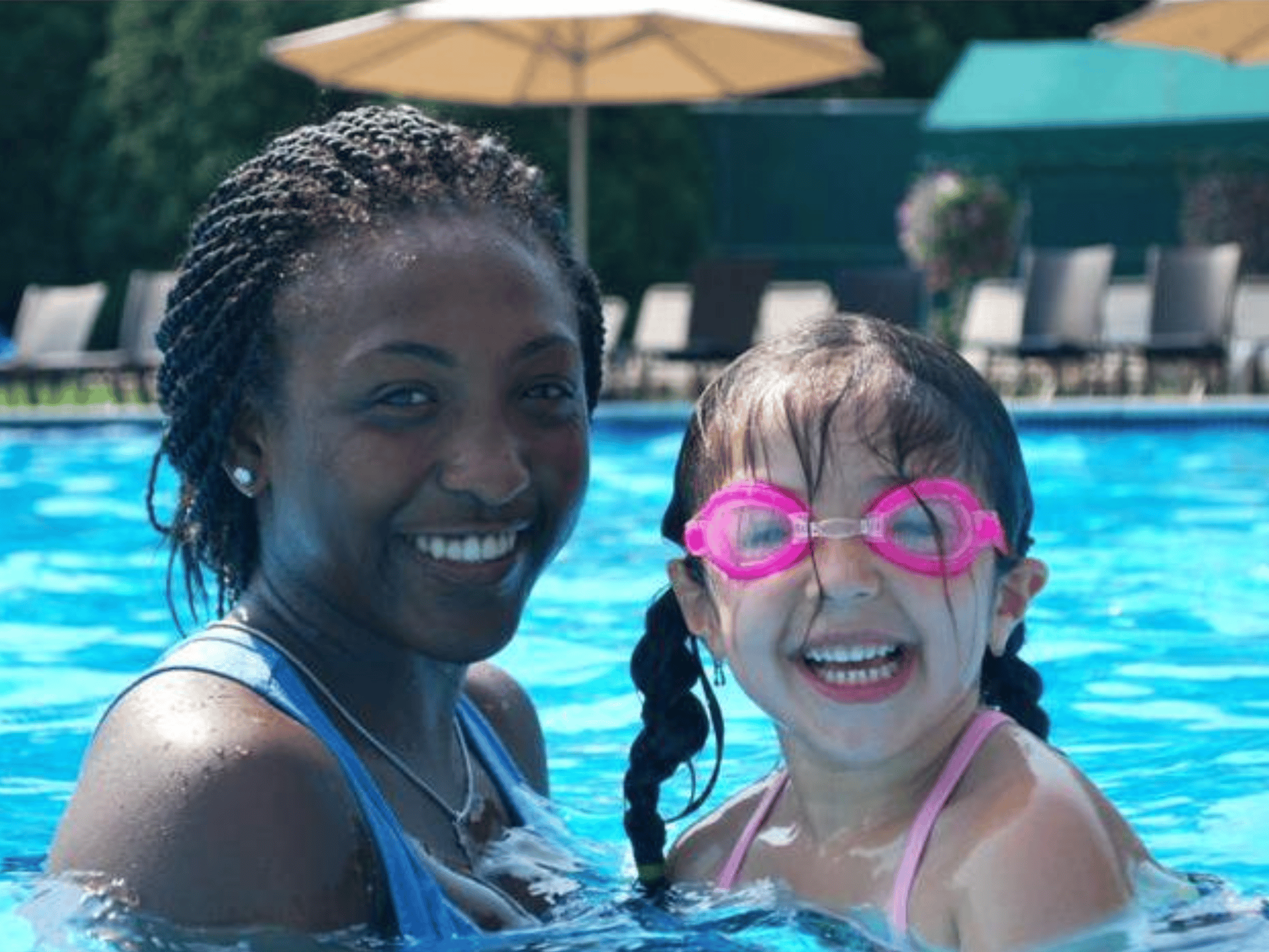Adult and child swimming at the YMCA