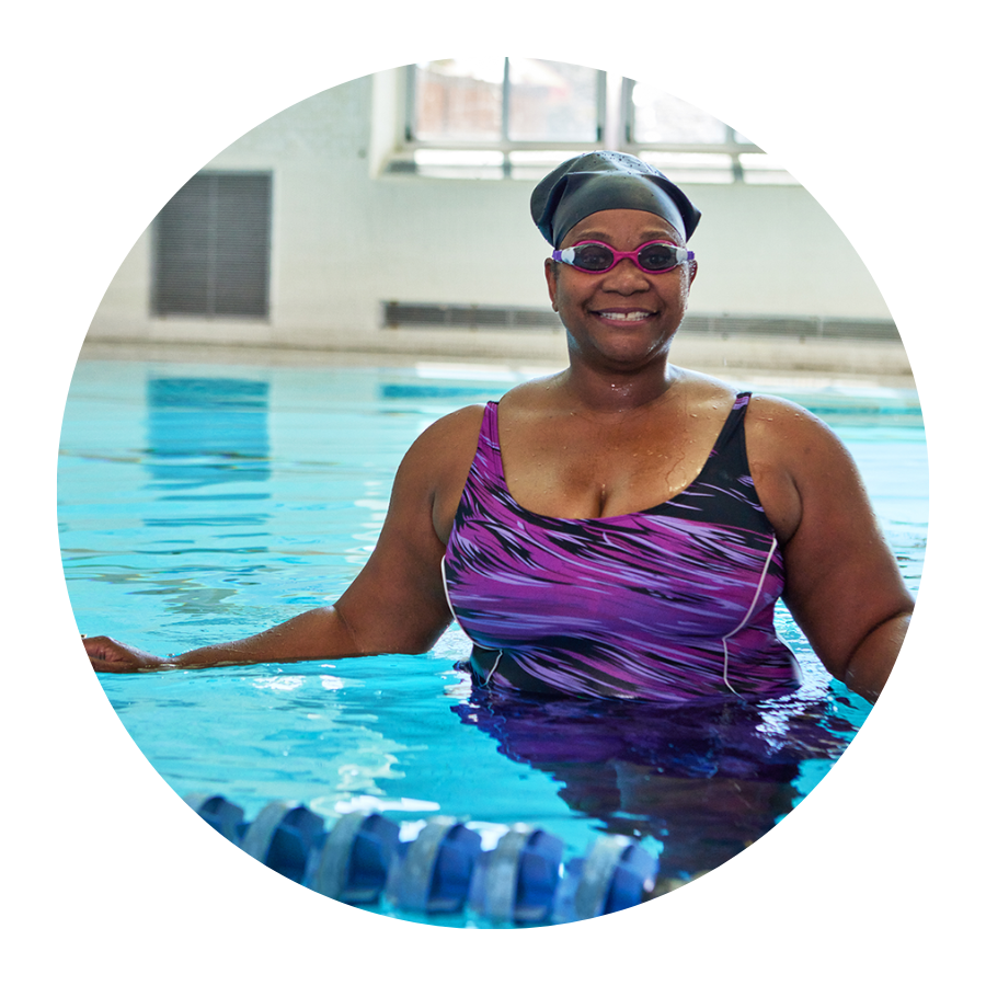 Older woman taking swim lessons at the YMCA