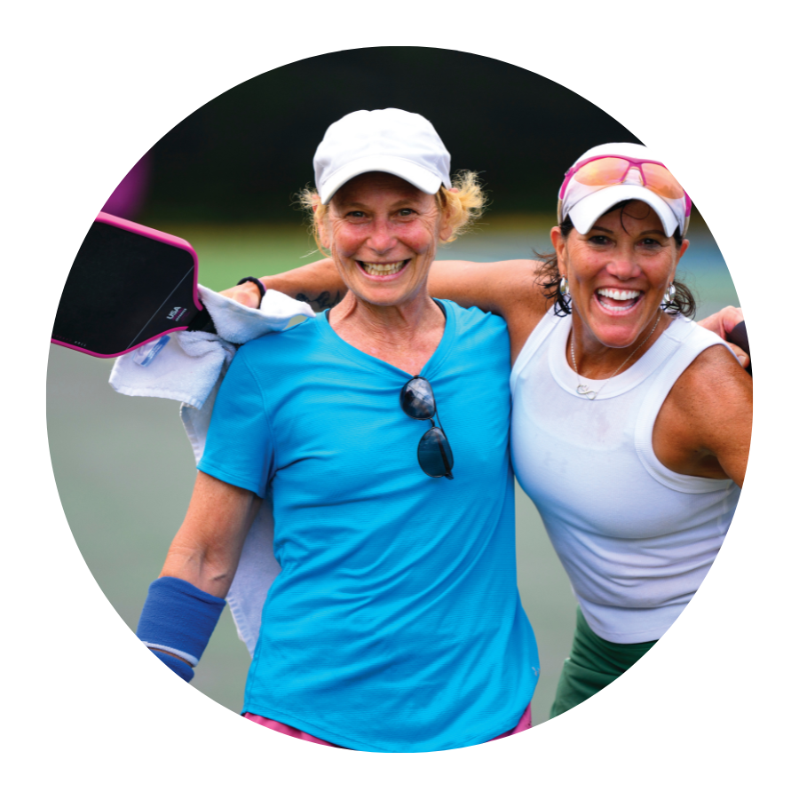 Two women playing pickleball at the Sussex County YMCA Pickleball Center