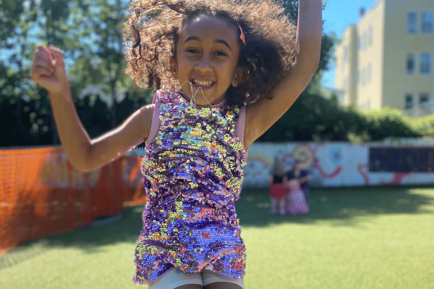 South Mountain YMCA preschool student jumping