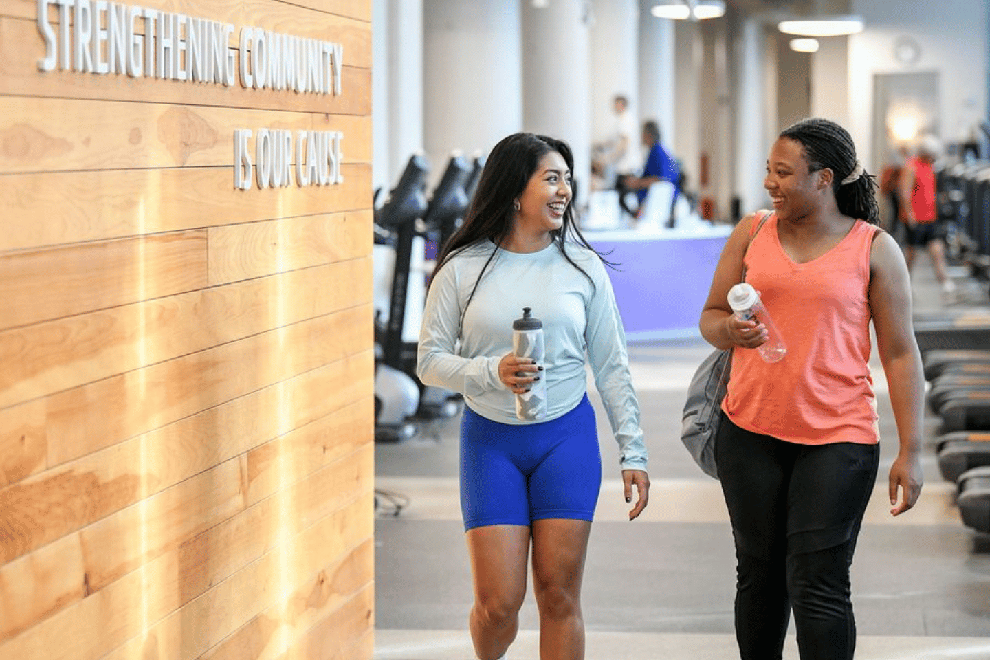 Two women walking at the YMCA