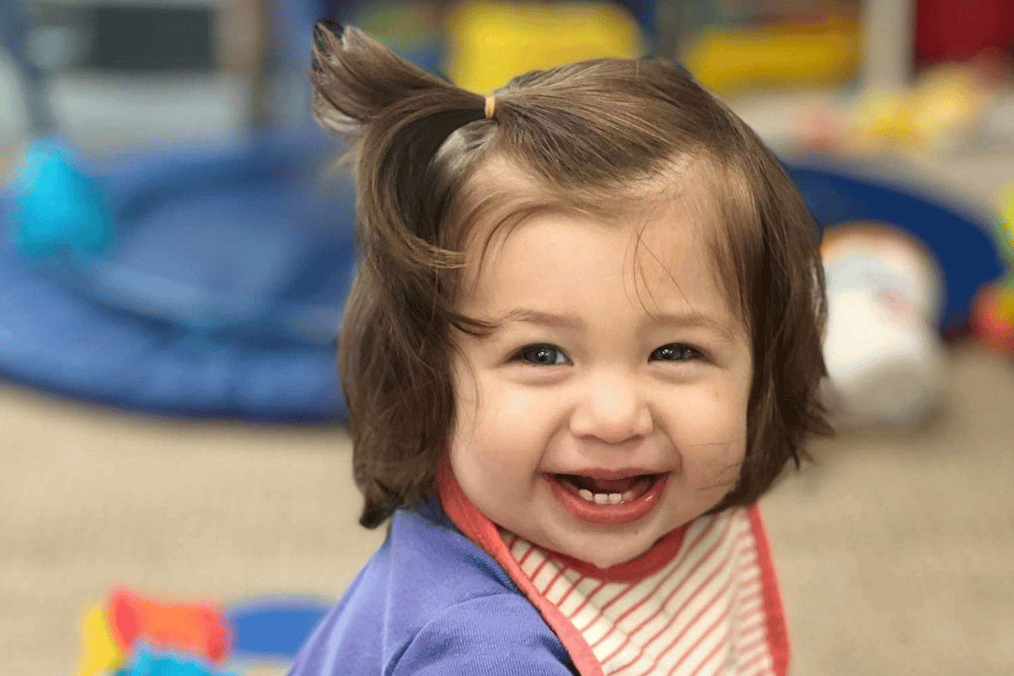 Little smiling girl at the YMCA child care