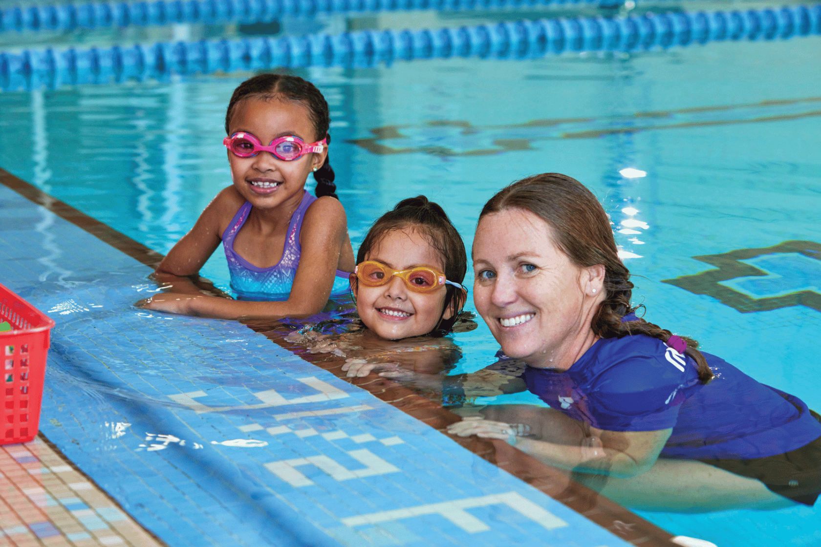 Swim instructor giving lessons at the YMCA