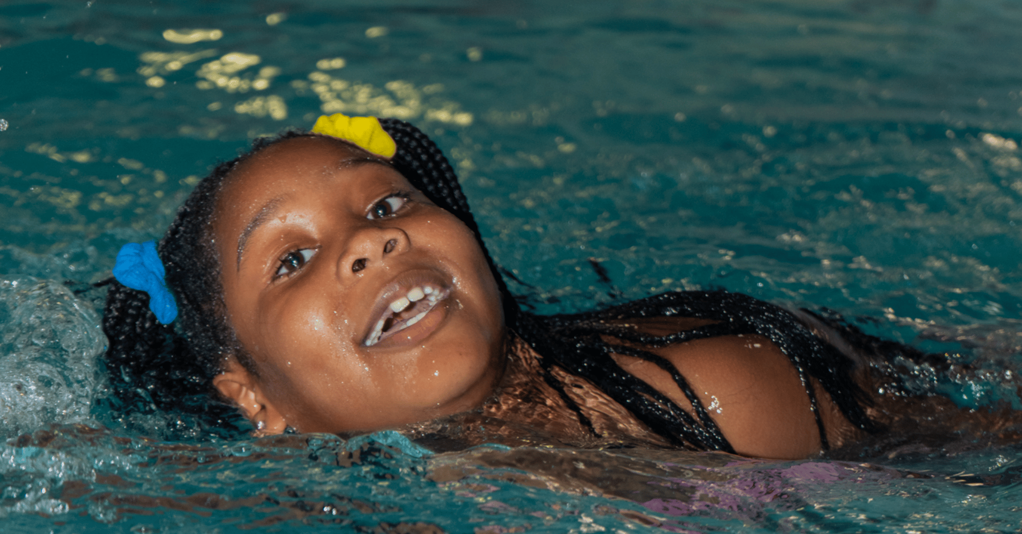 Girl swimming at East Orange YMCA Day Camp