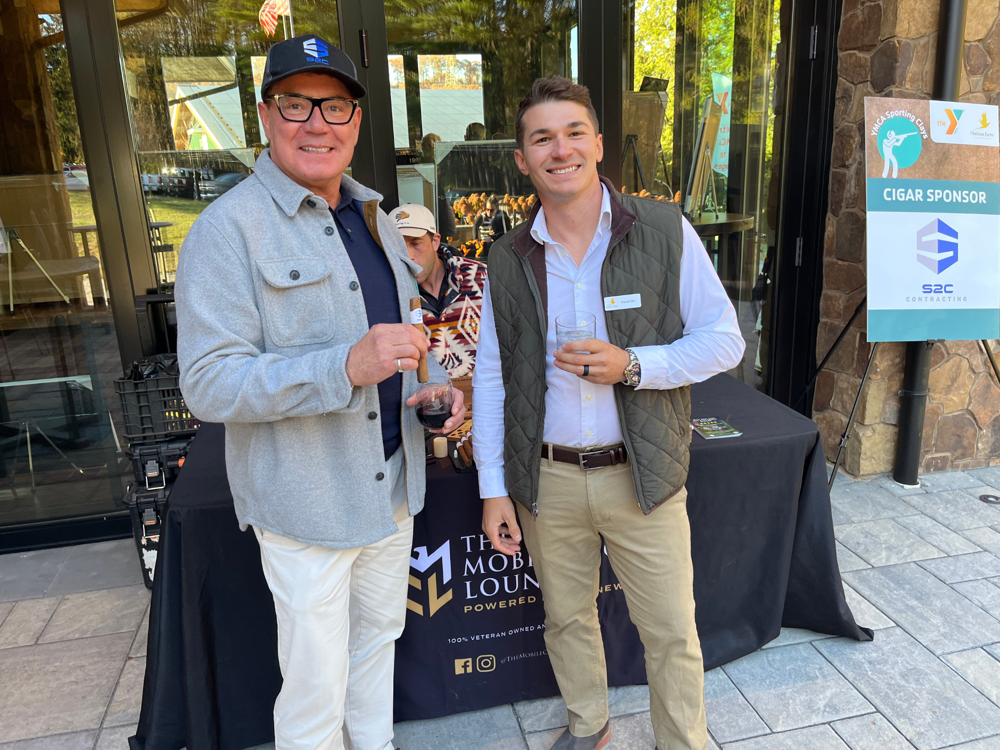 Two Y supporters stop for a photo at the YMCA Sporting Clays event