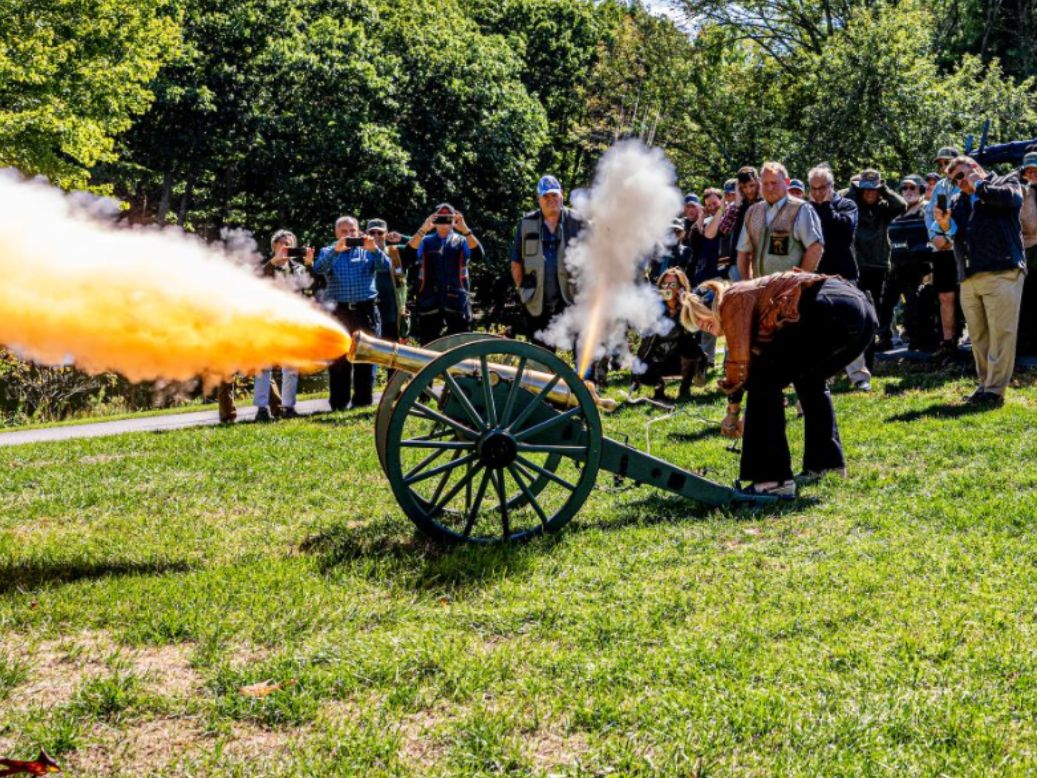 An event participant shooting off the cannon at the YMCA Sporting Clays Event