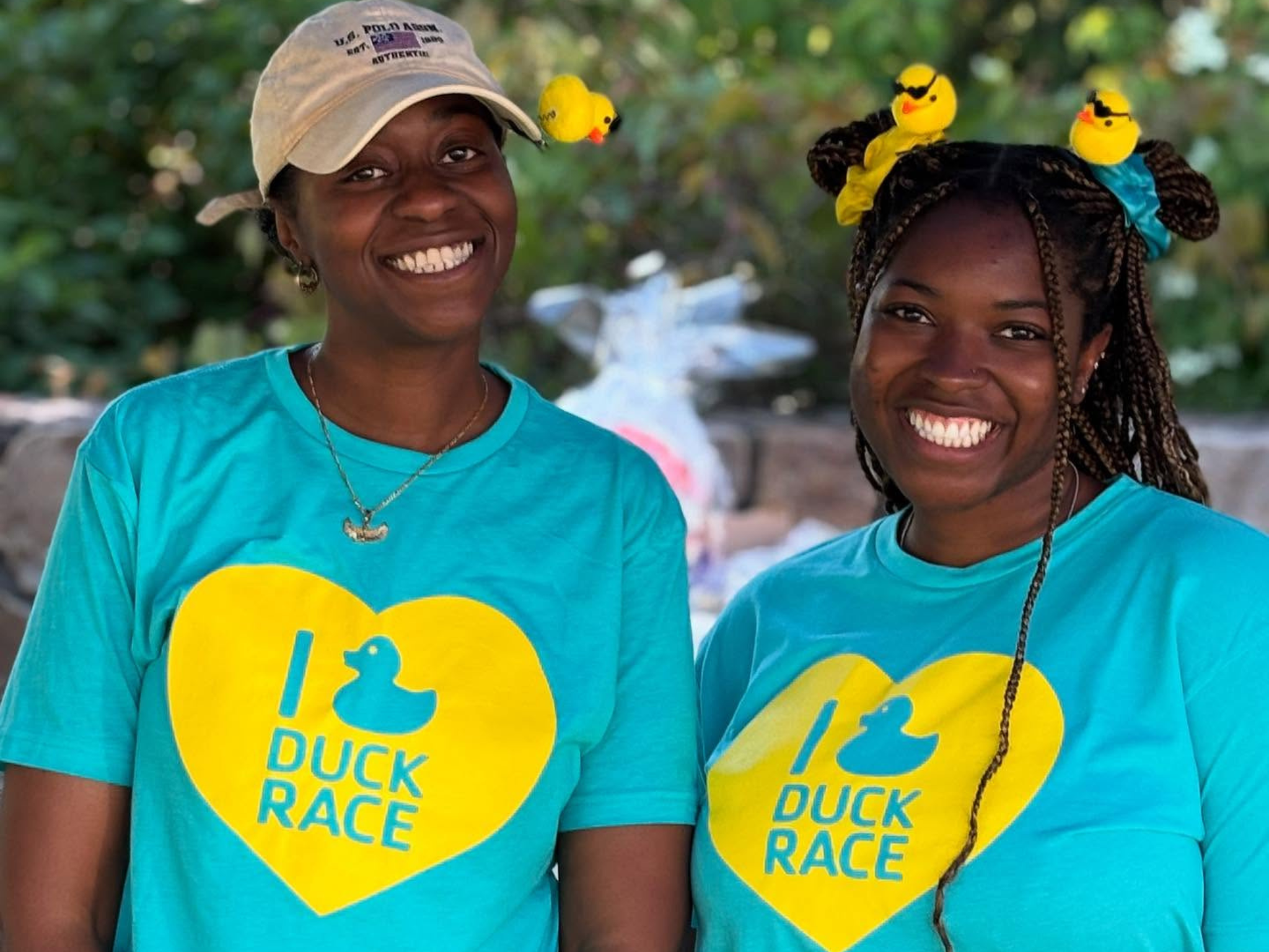 Two YMCA staff smiling at the South Mountain YMCA Duck Race