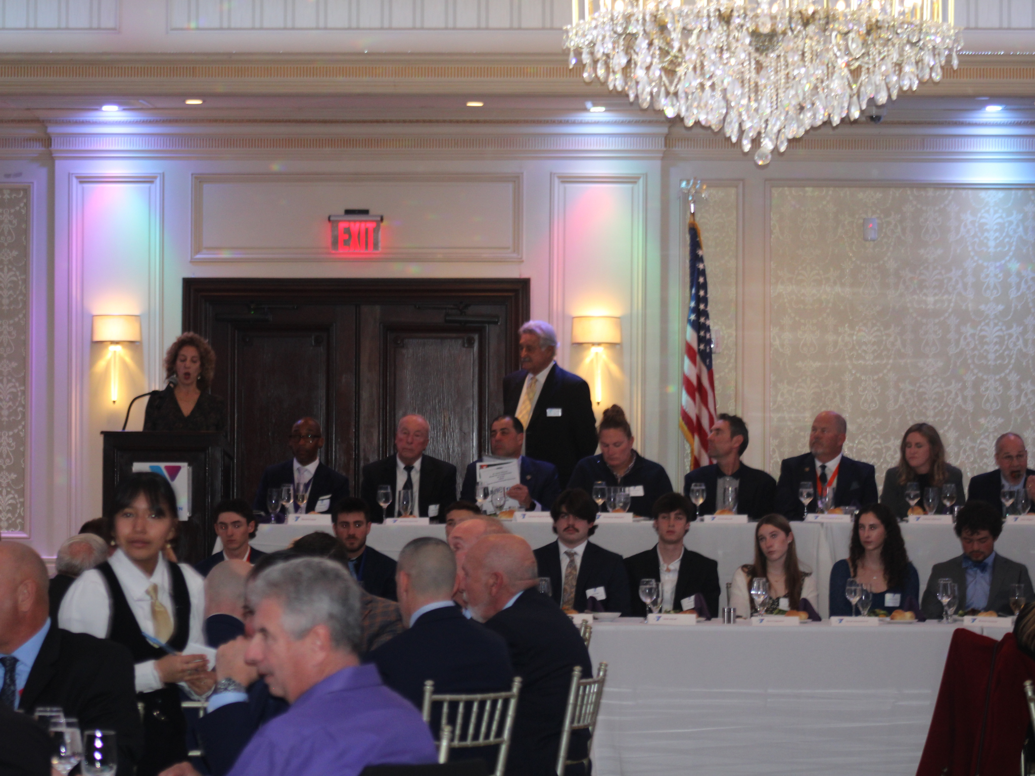 Honorees listening to a speech at the Greater Bergen Sports Awards Banquet
