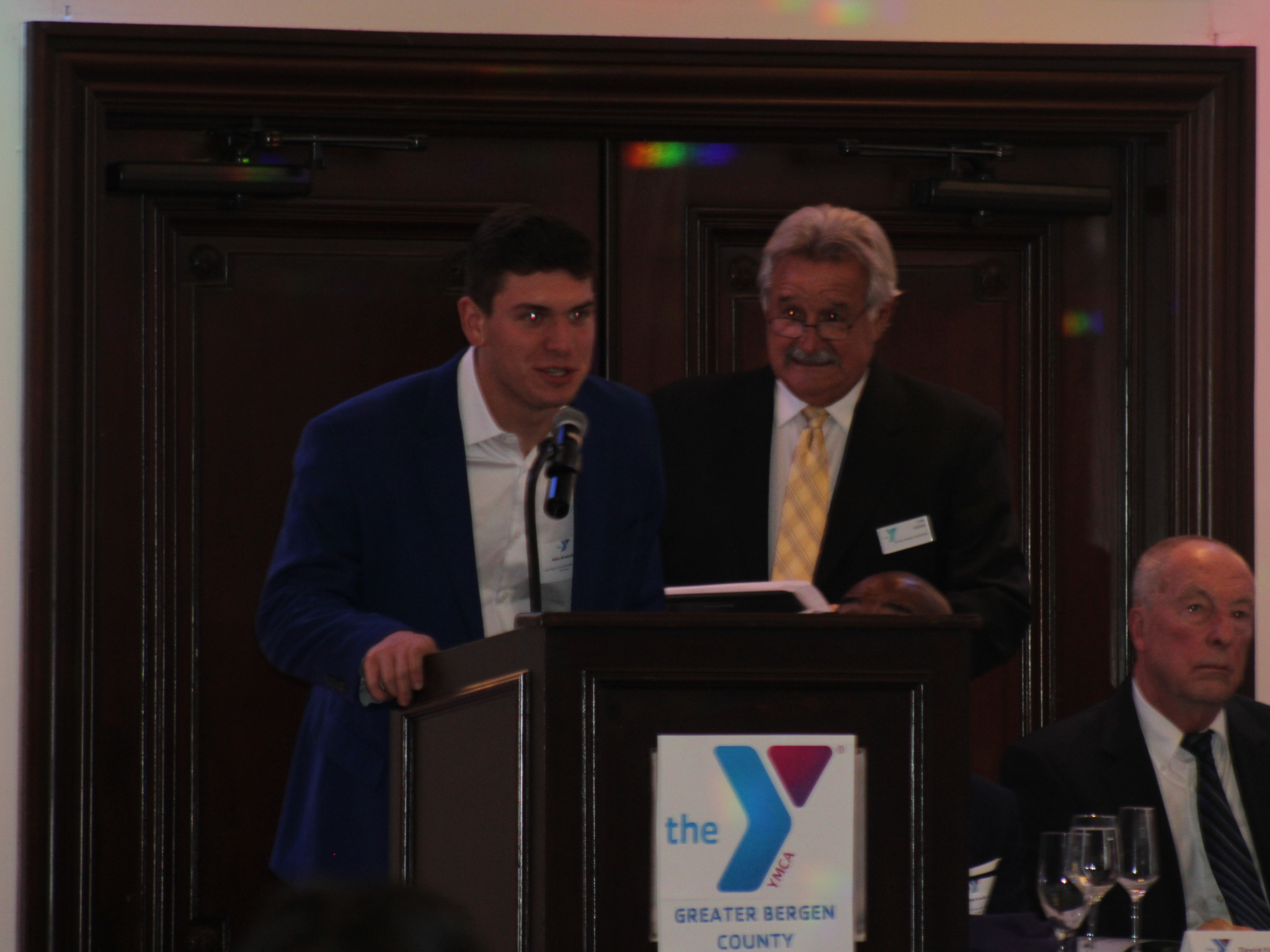 Honoree accepting an award at the Greater Bergen Sports Awards Banquet