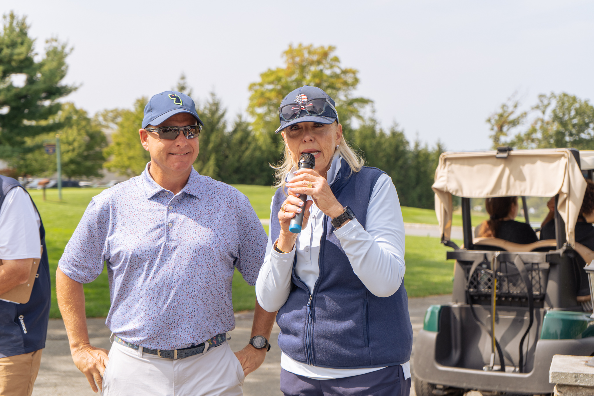 A Y member welcoming golfers at the Sussex County YMCA Golf Outing