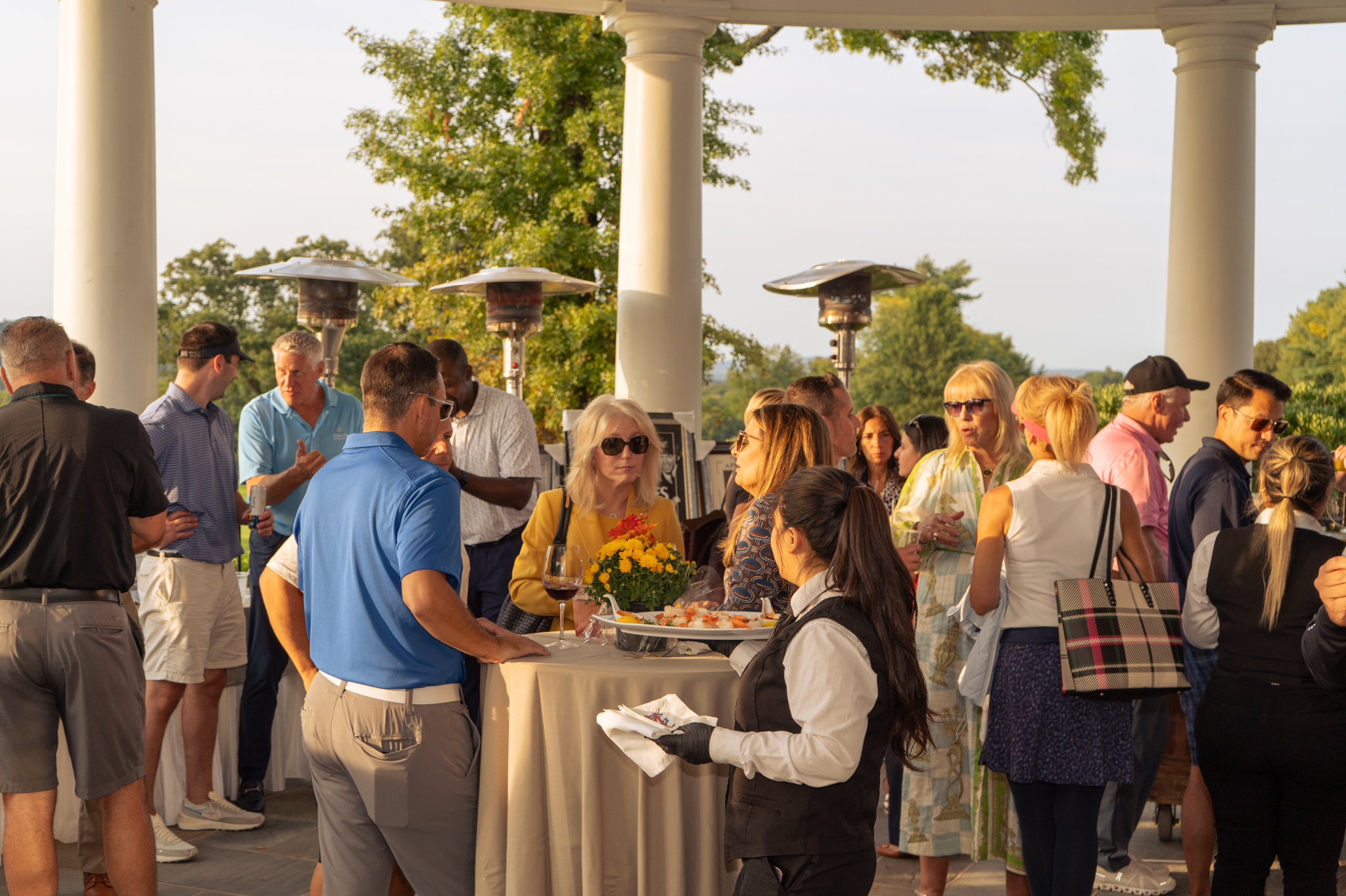 Golfers enjoying the evening reception at the Sussex County YMCA Golf Outing