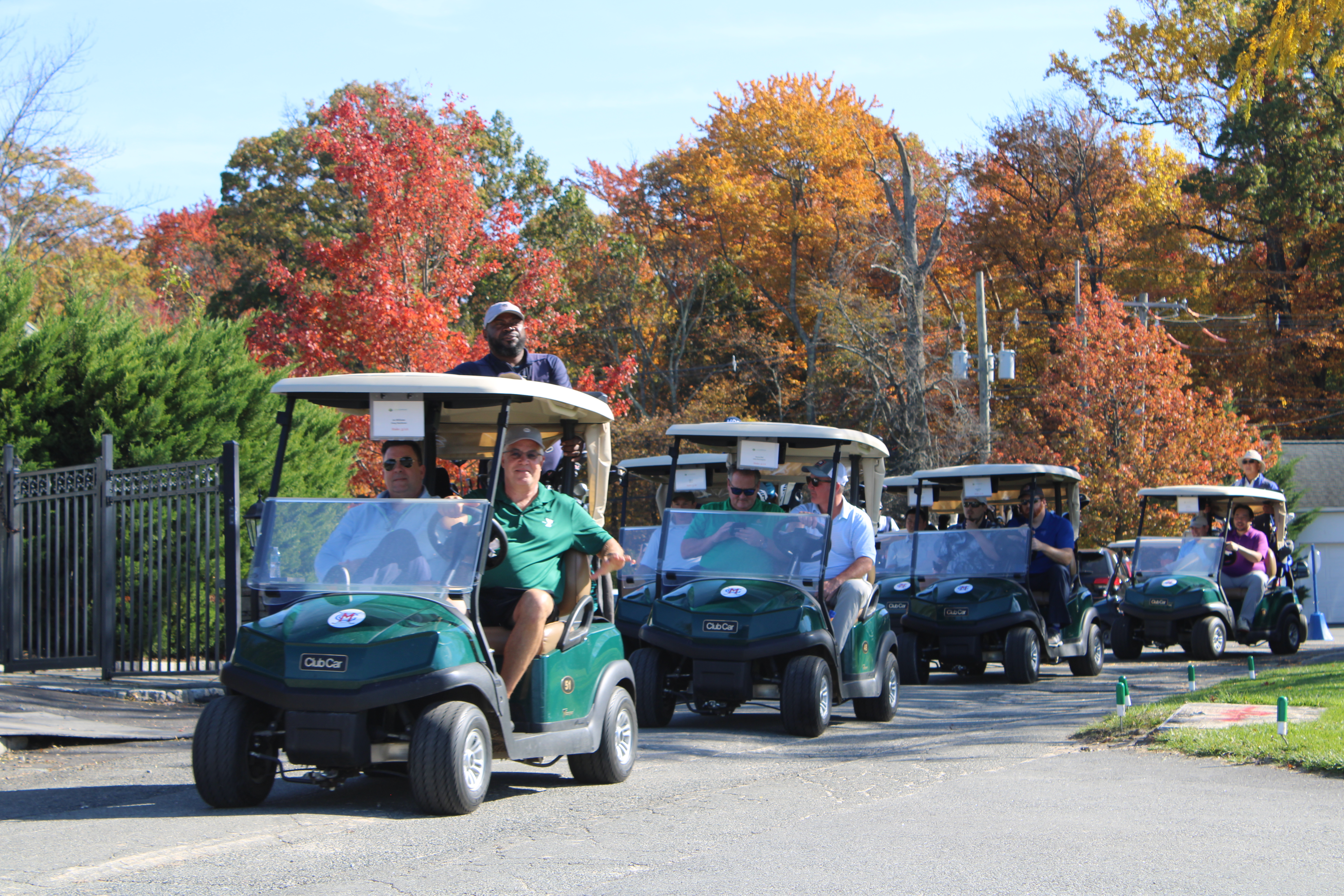 A line of golf carts with golfers ready to play at the Metro YMCA Golf Outing in New Jersey