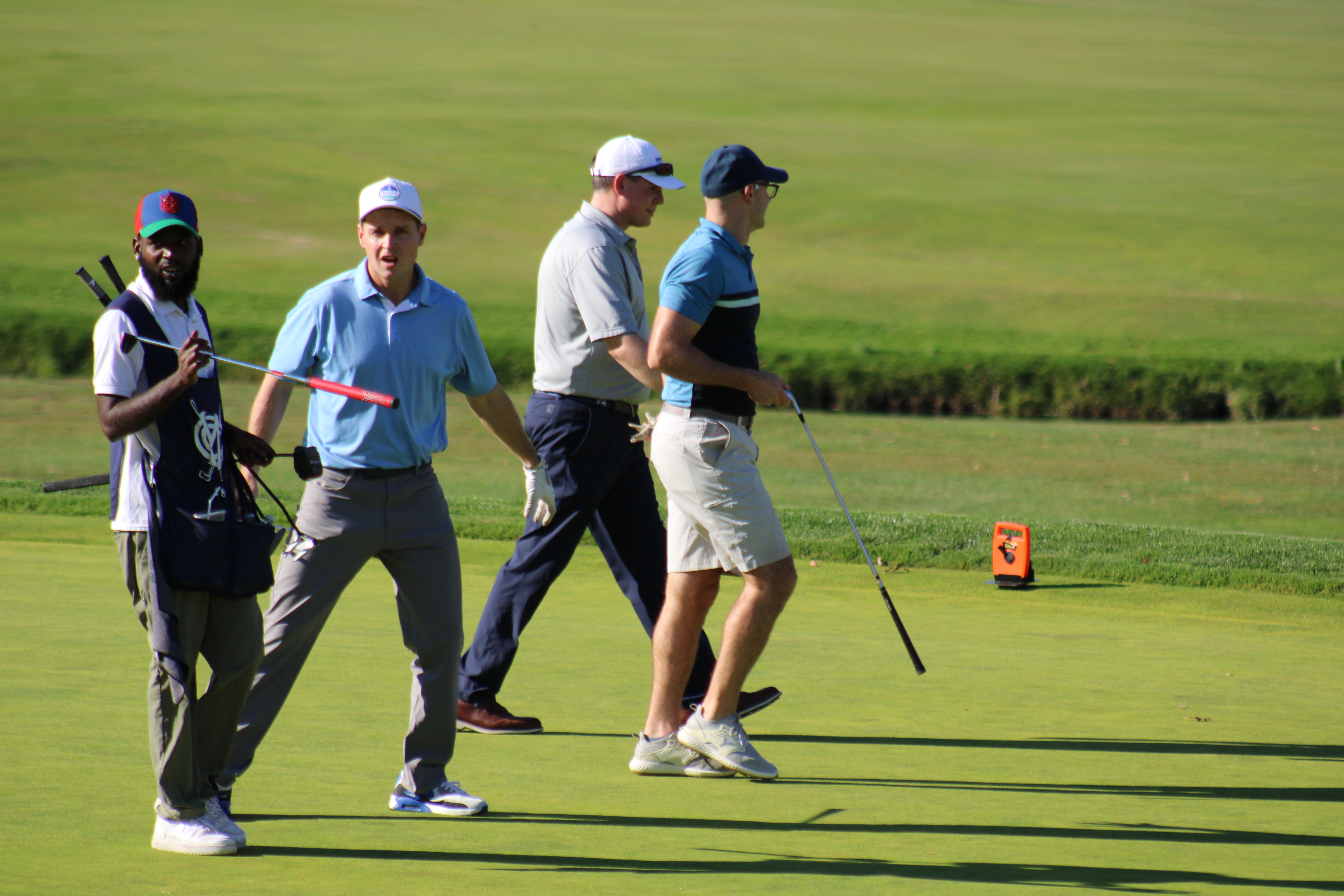 Golf team walking to the next whole at the Metro YMCA Golf Outing in New Jersey