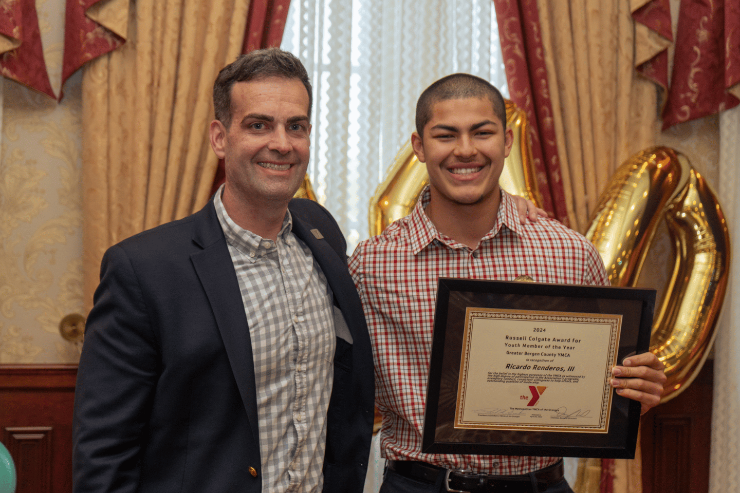 Student athlete receiving an award at the Greater Bergen County Sports Awards Banquet